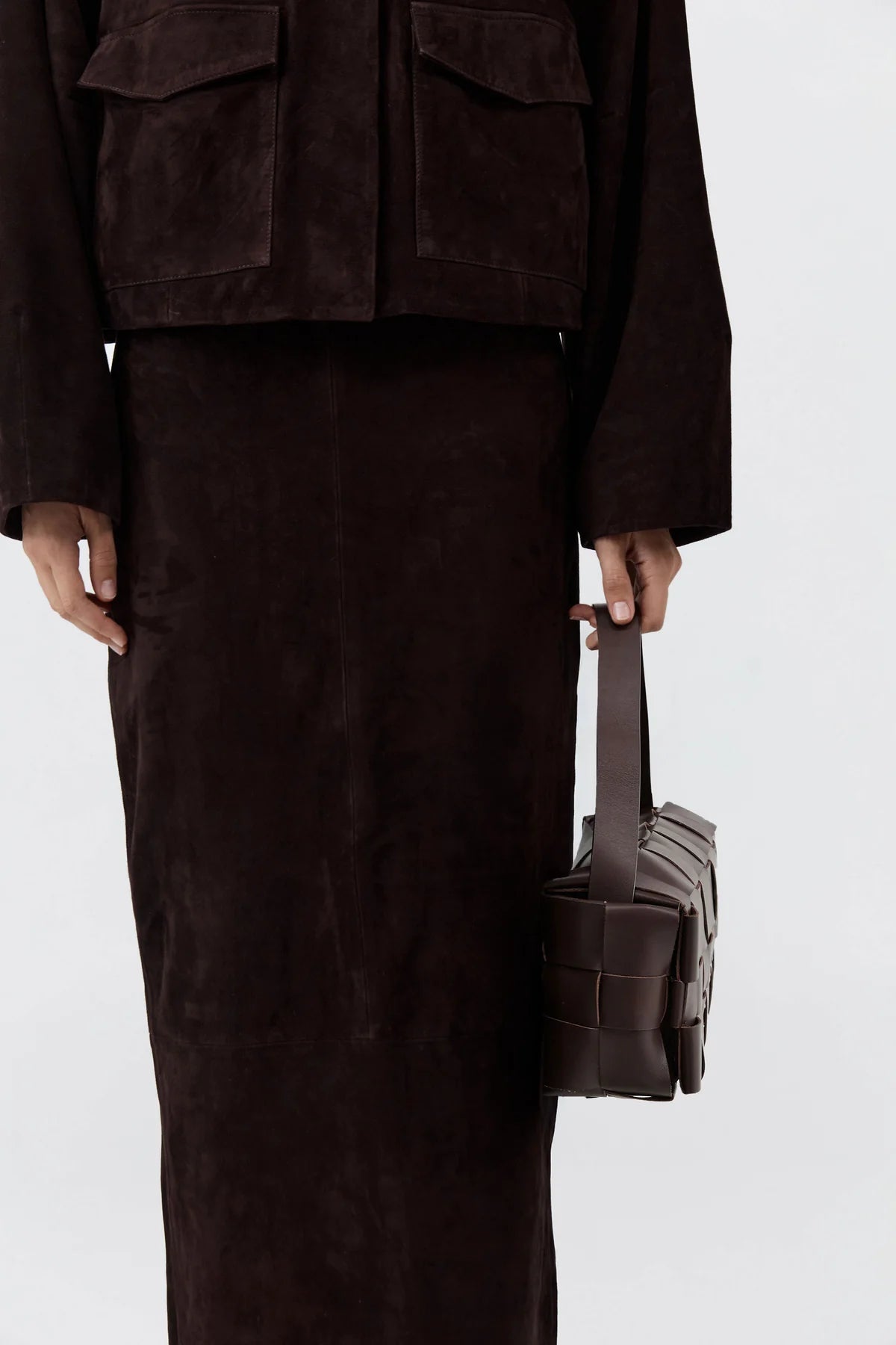 
                  
                    Woven Envelope Slim Bag Choclolate
                  
                