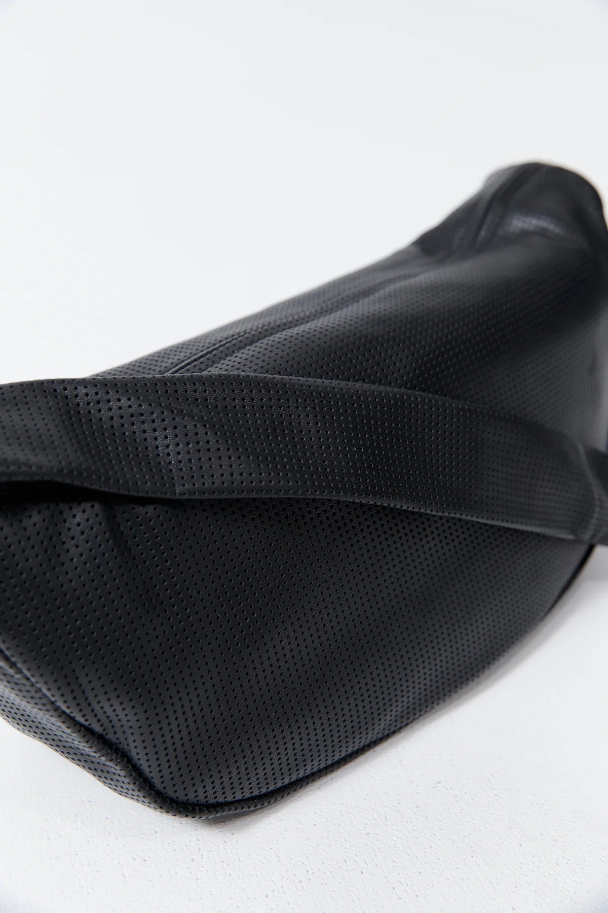 
                  
                    Perforated Crescent Bag
                  
                