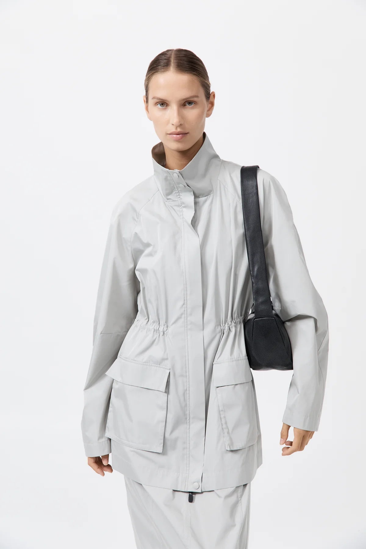 
                  
                    Perforated Crescent Bag
                  
                