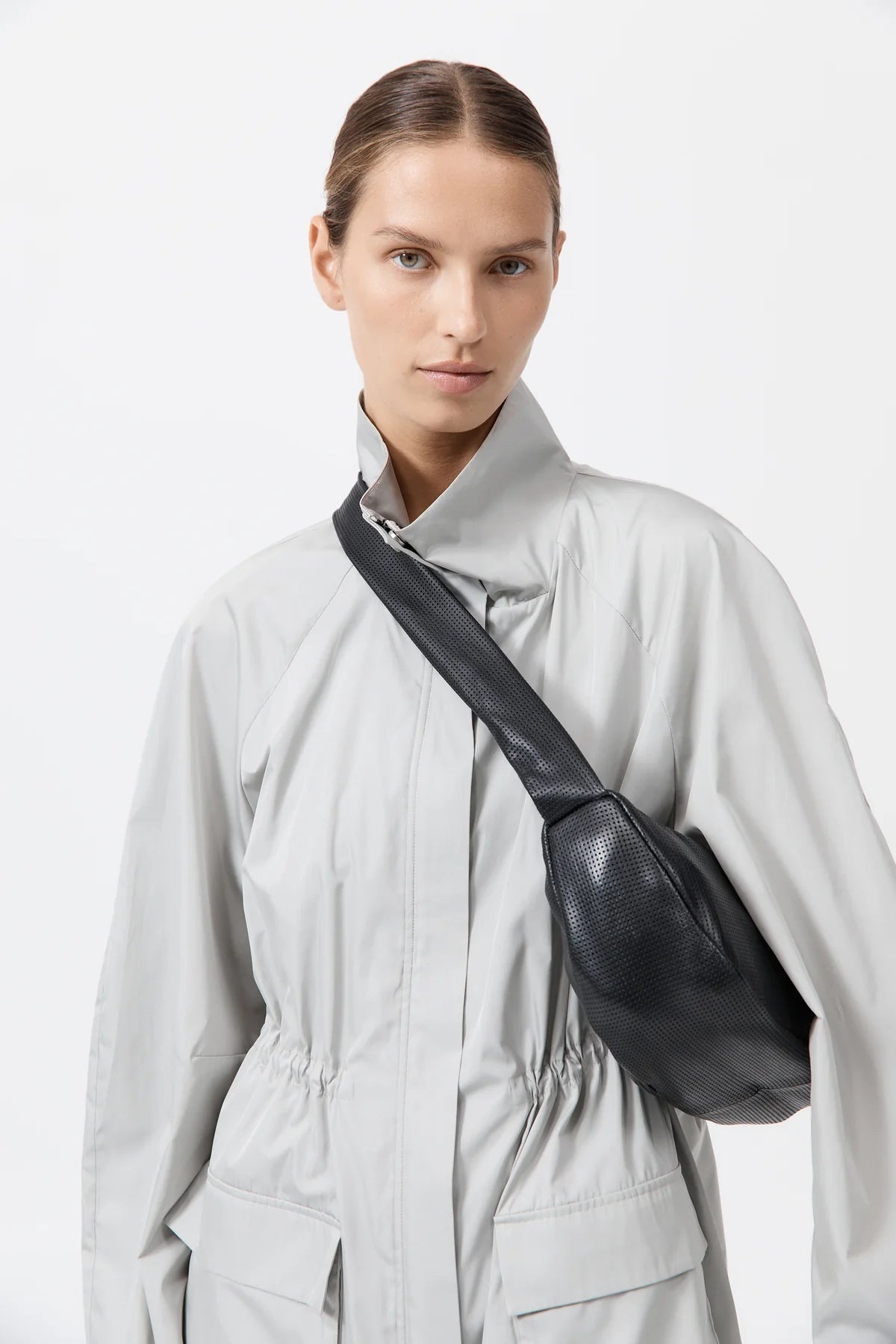 
                  
                    Perforated Crescent Bag
                  
                