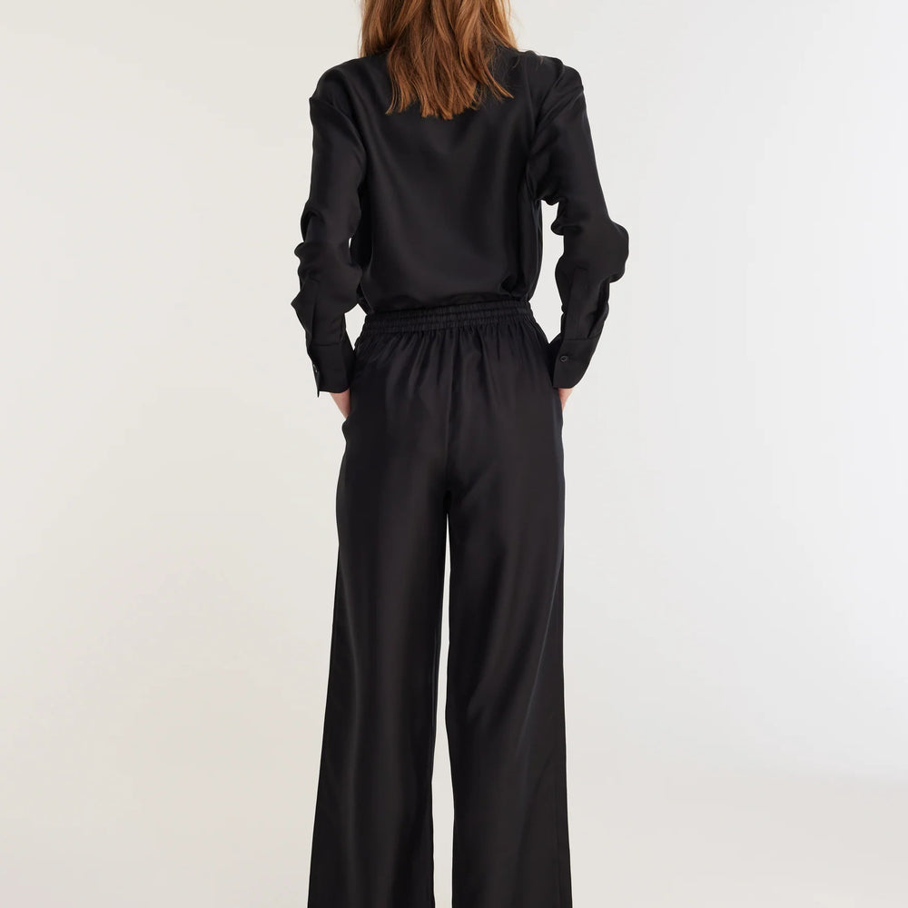 
                  
                    Raw Edge Tailored Trousers Noir
                  
                