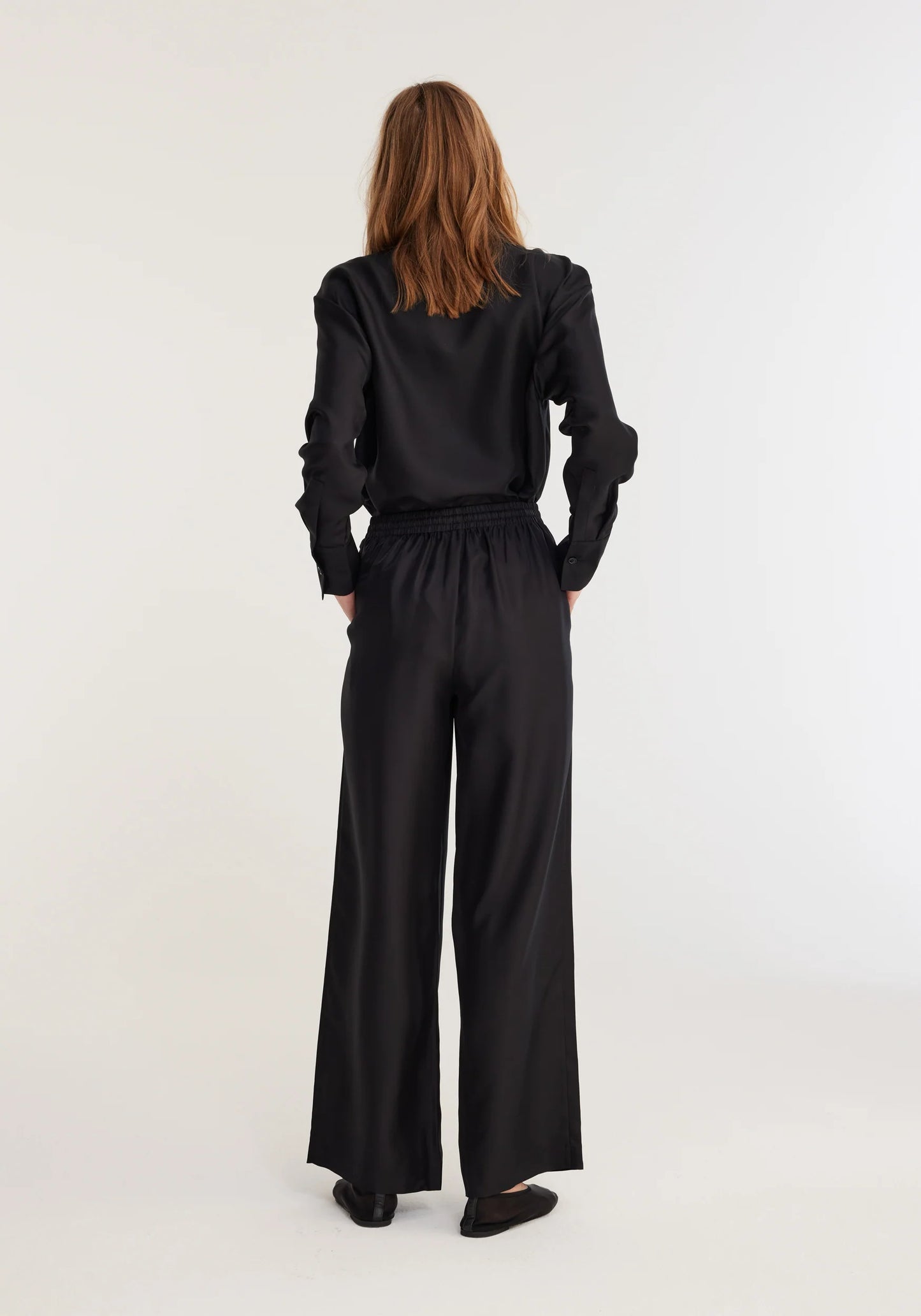 
                  
                    Raw Edge Tailored Trousers Noir
                  
                