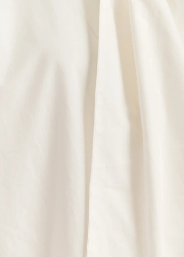 
                  
                    Greta Off-white cotton shirt with pussy bow
                  
                