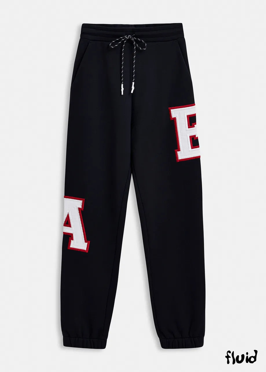 
                  
                    Grue Black Cotton Sweatpants with Embroidered Patches
                  
                
