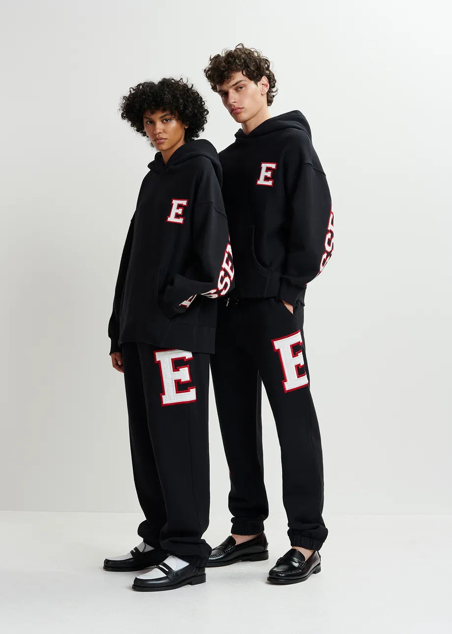 
                  
                    Grue Black Cotton Sweatpants with Embroidered Patches
                  
                
