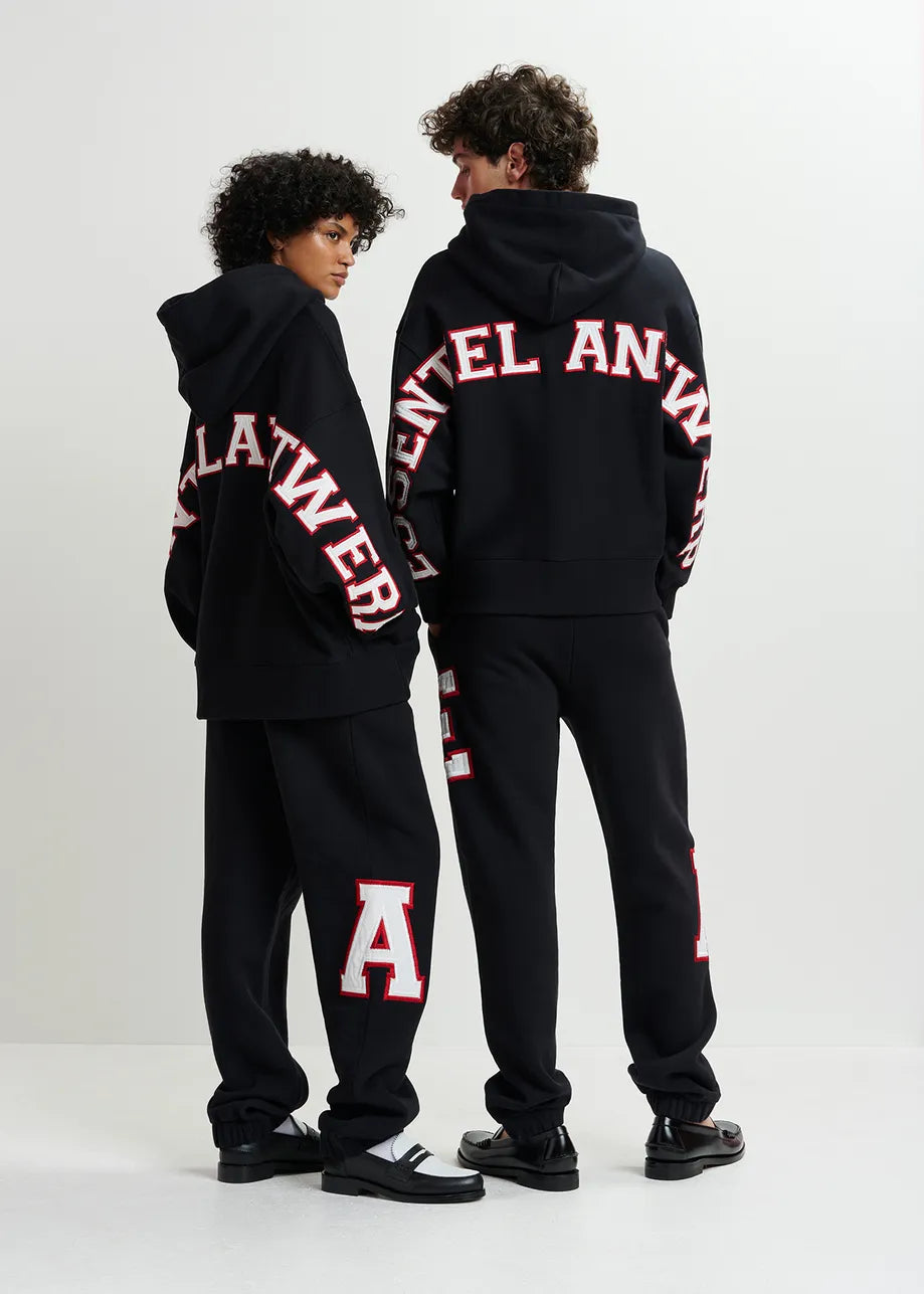 
                  
                    Grue Black Cotton Sweatpants with Embroidered Patches
                  
                