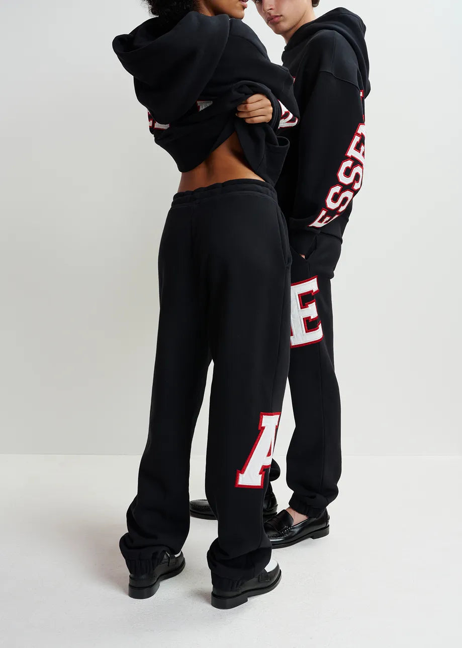 
                  
                    Grue Black Cotton Sweatpants with Embroidered Patches
                  
                