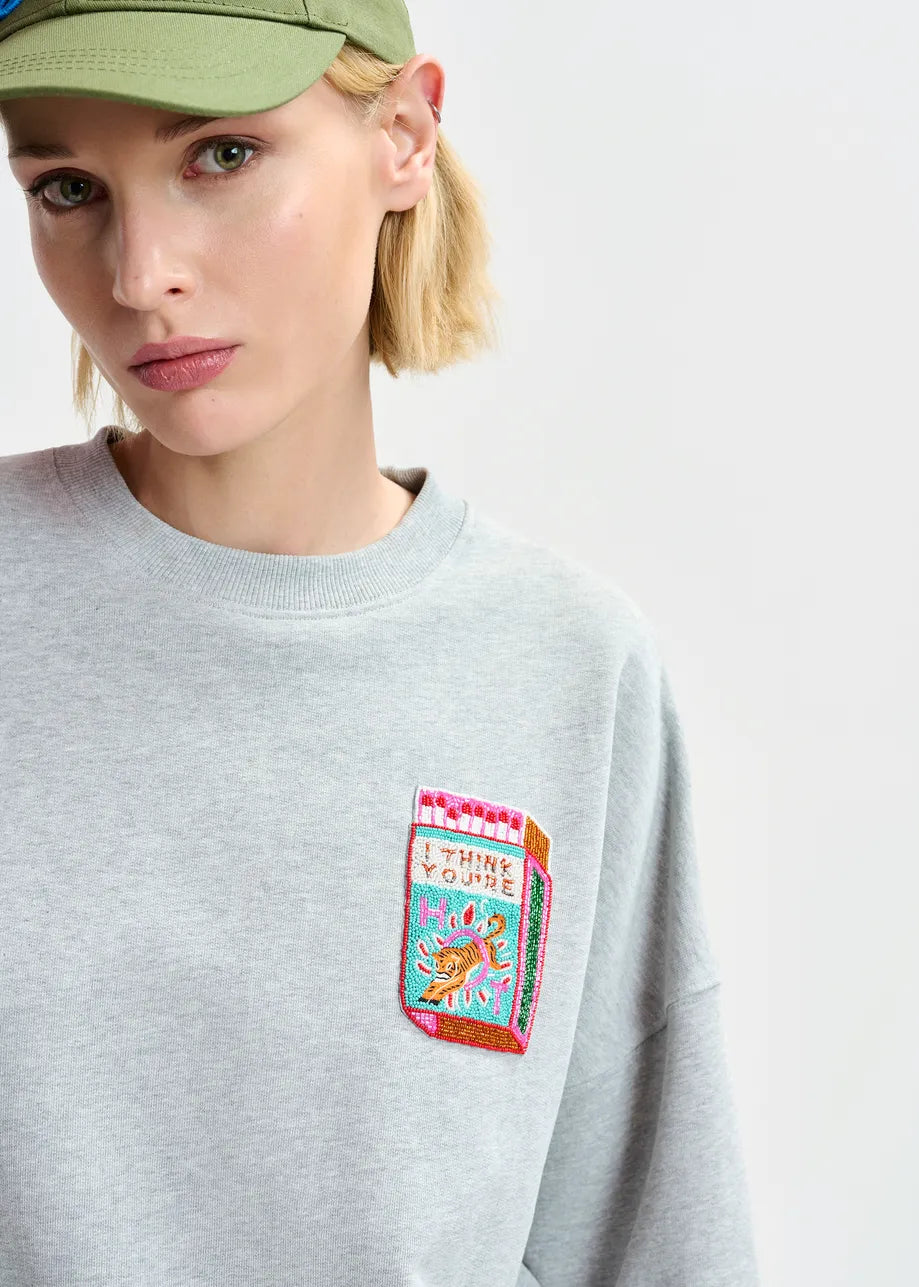 
                  
                    Hallumettes Embroidered Sweater
                  
                