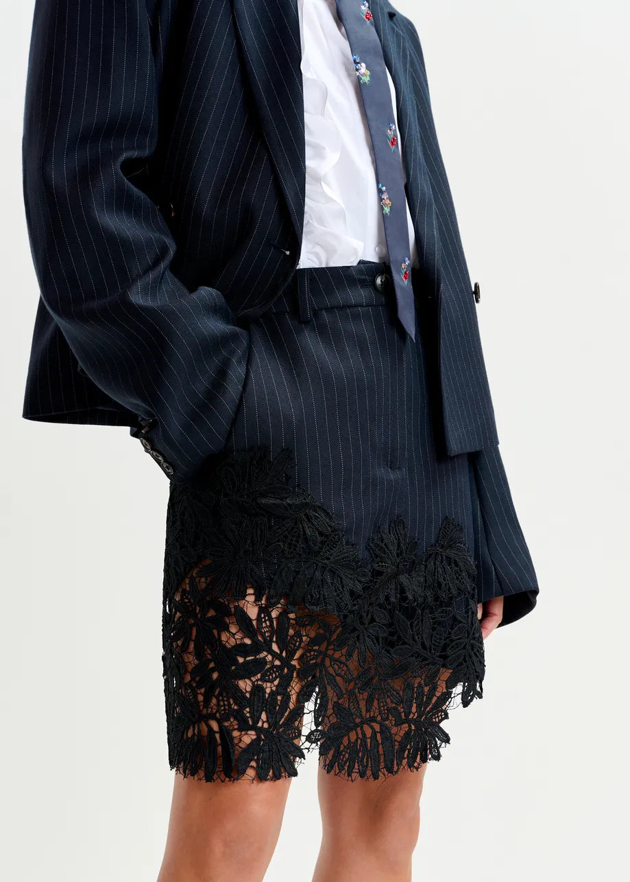 
                  
                    Interior Asymmetrical Navy Skirt with Lace
                  
                