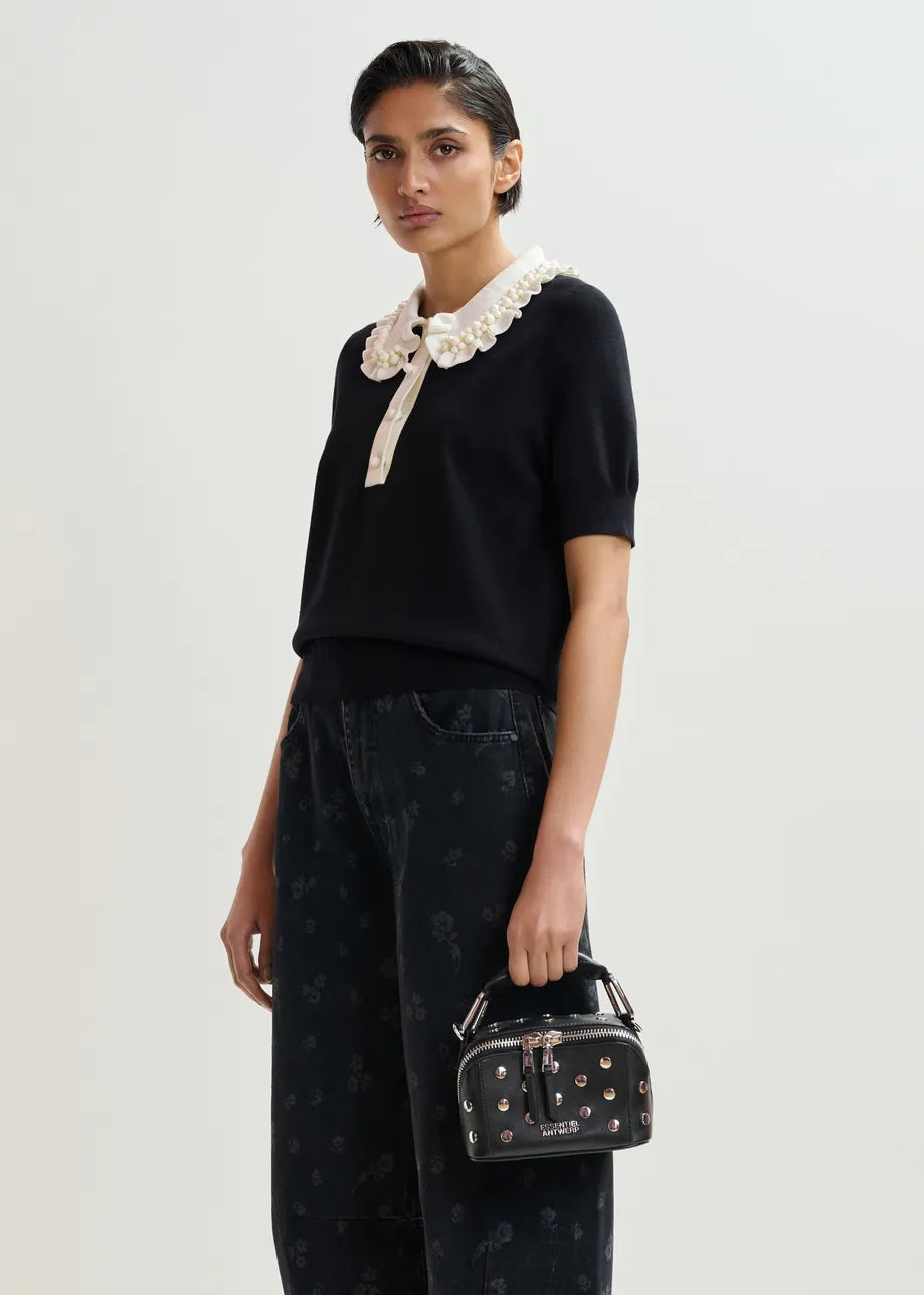 
                  
                    Jewelry Black And Off-White Ruffle Fine-Knit Polo Top
                  
                
